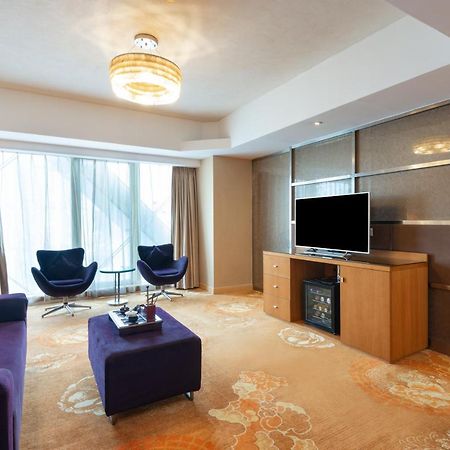 Holiday Inn Binhai Тяньцзинь Экстерьер фото