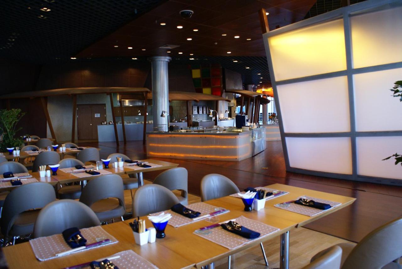 Holiday Inn Binhai Тяньцзинь Экстерьер фото