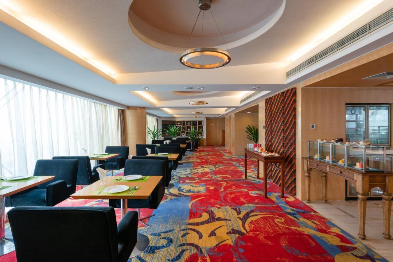 Holiday Inn Binhai Тяньцзинь Экстерьер фото