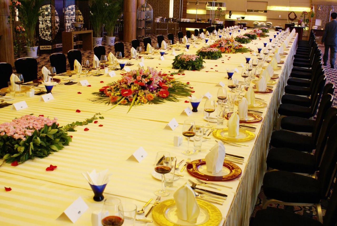 Holiday Inn Binhai Тяньцзинь Экстерьер фото