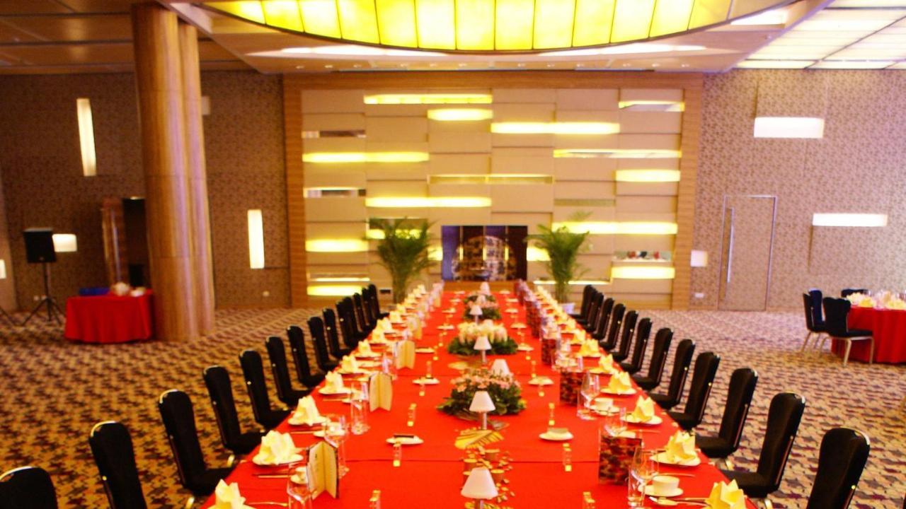 Holiday Inn Binhai Тяньцзинь Экстерьер фото