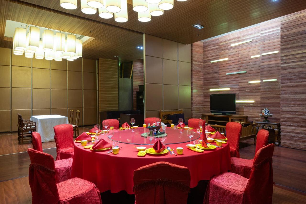 Holiday Inn Binhai Тяньцзинь Экстерьер фото