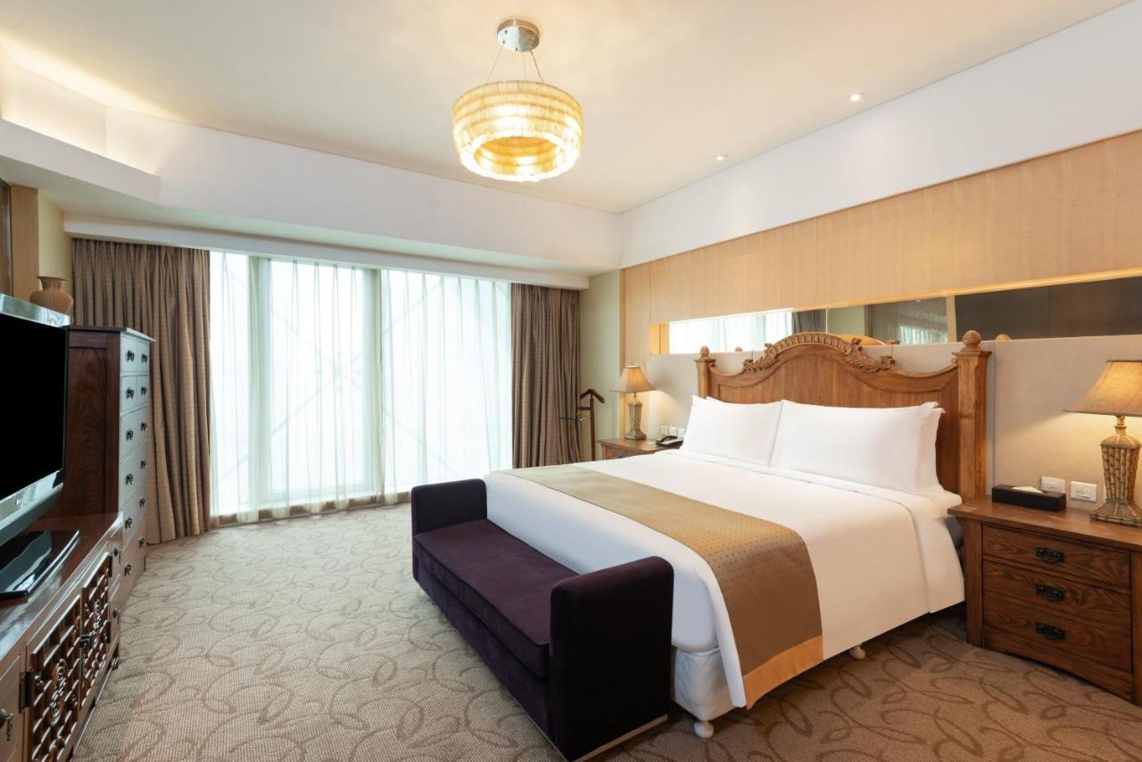 Holiday Inn Binhai Тяньцзинь Экстерьер фото