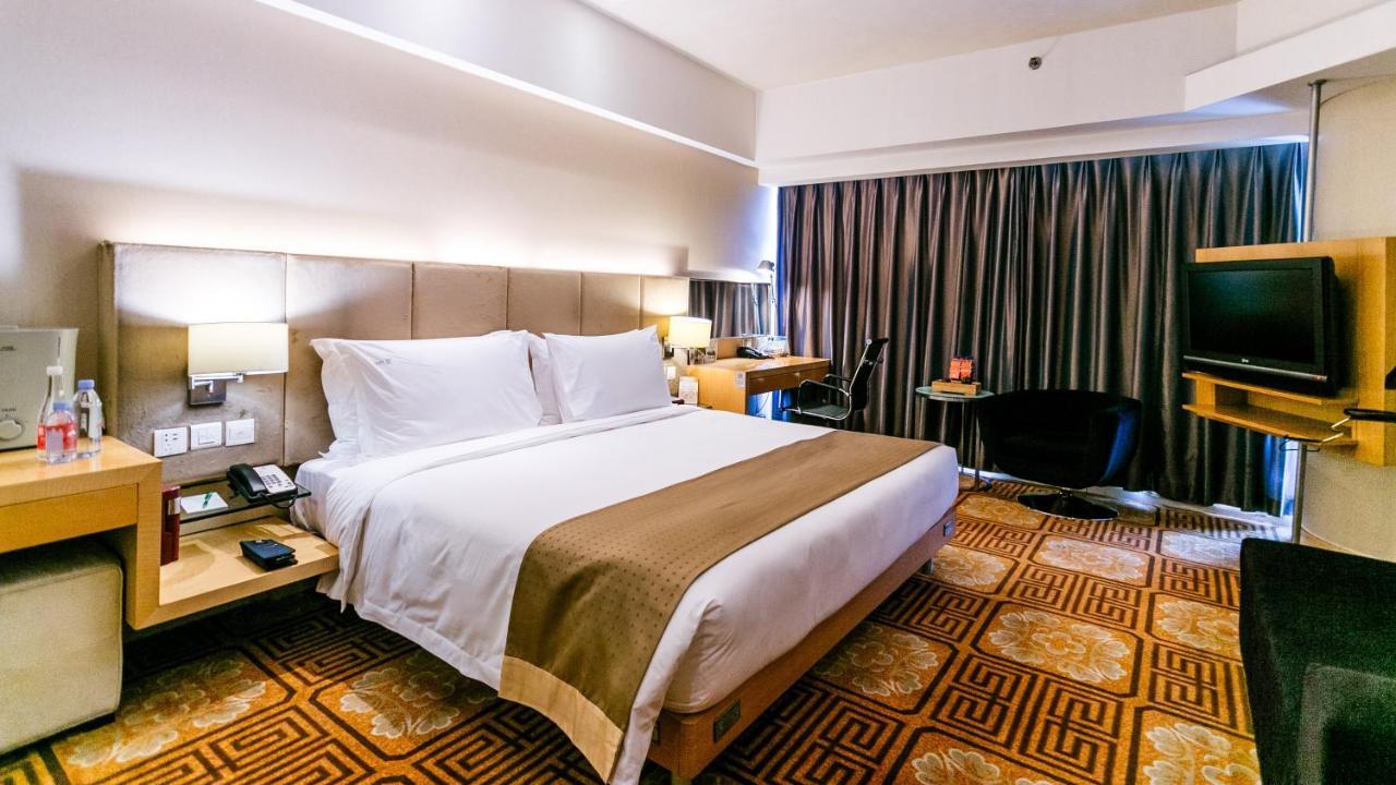 Holiday Inn Binhai Тяньцзинь Экстерьер фото