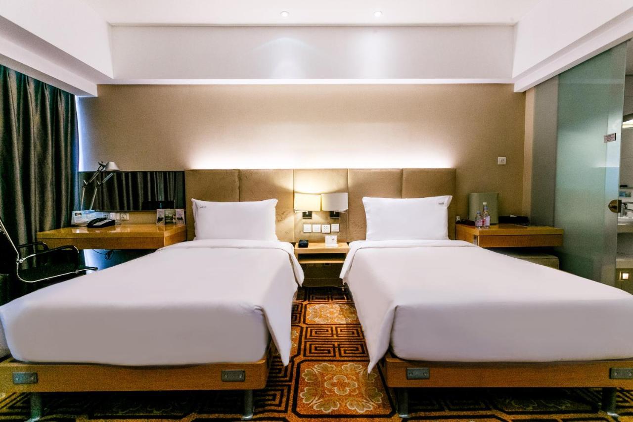Holiday Inn Binhai Тяньцзинь Экстерьер фото