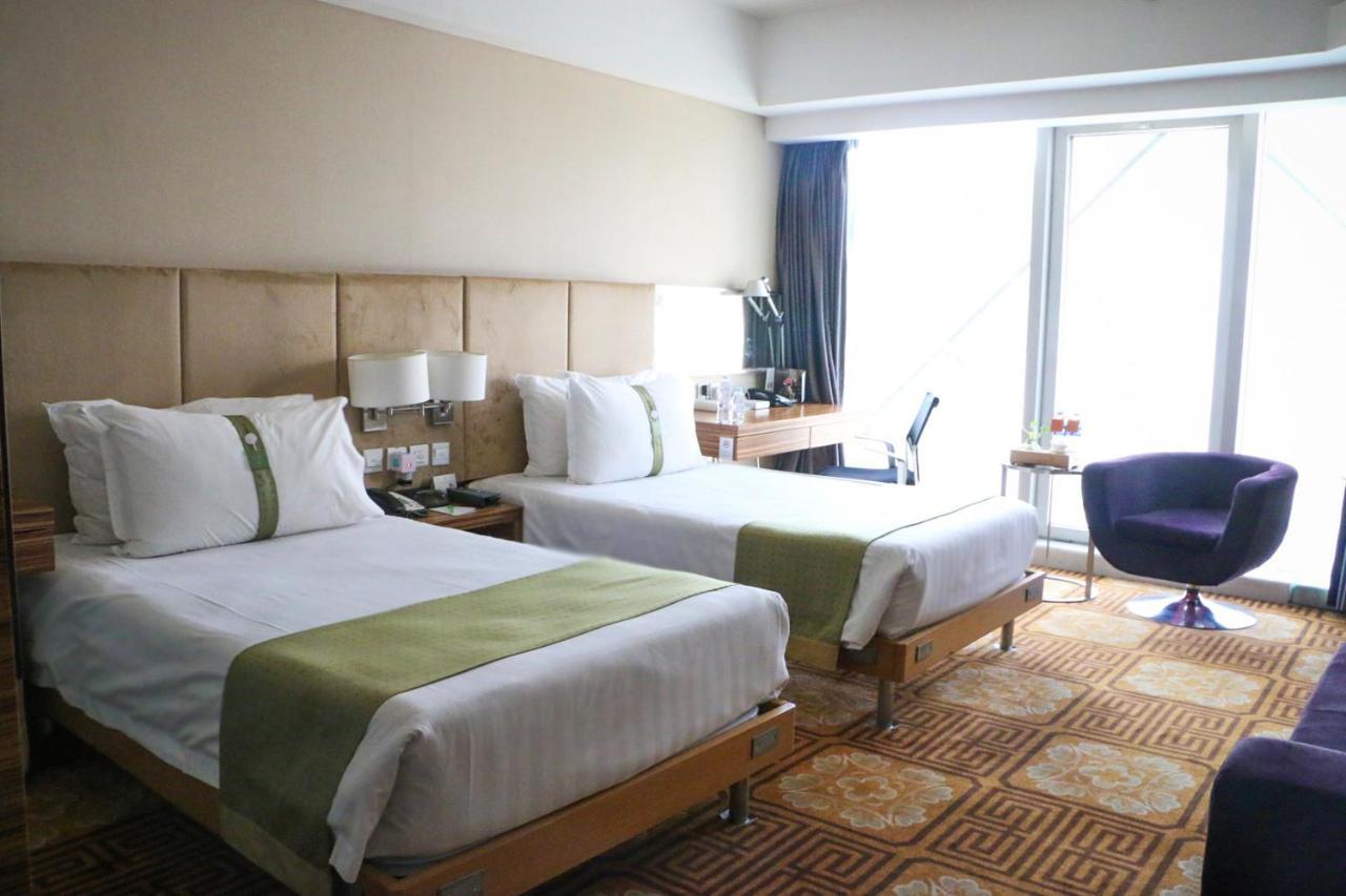 Holiday Inn Binhai Тяньцзинь Экстерьер фото